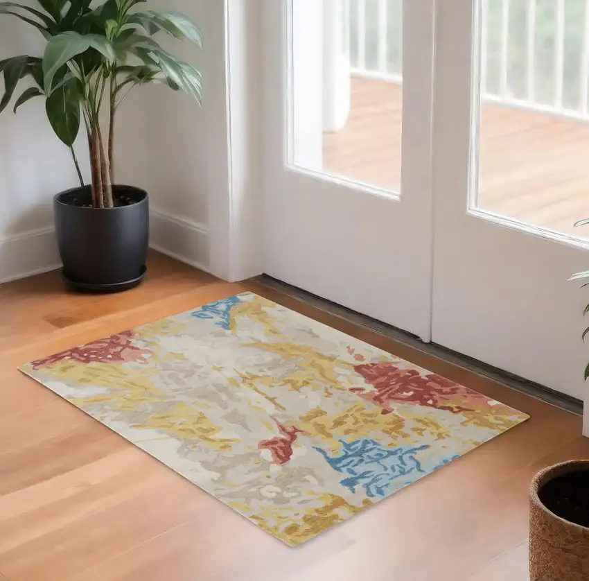 Ivory Yellow And Blue Wool Abstract Tufted Handmade Stain Resistant Area Rug Photo 1
