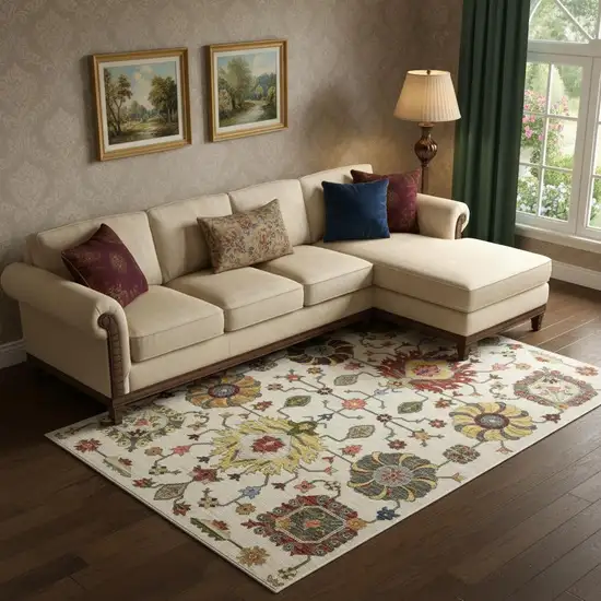 6' X 9' Ivory Yellow Rust Green Grey Pink Orange Blue And Grey Oriental Power Loom Stain Resistant Area Rug With Fringe Photo 1