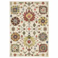 Photo of Ivory Yellow Rust Green Grey Pink Orange Blue And Grey Oriental Power Loom Stain Resistant Area Rug With Fringe