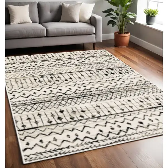 Ivory And Black Abstract Geometric Distressed Area Rug Photo 1