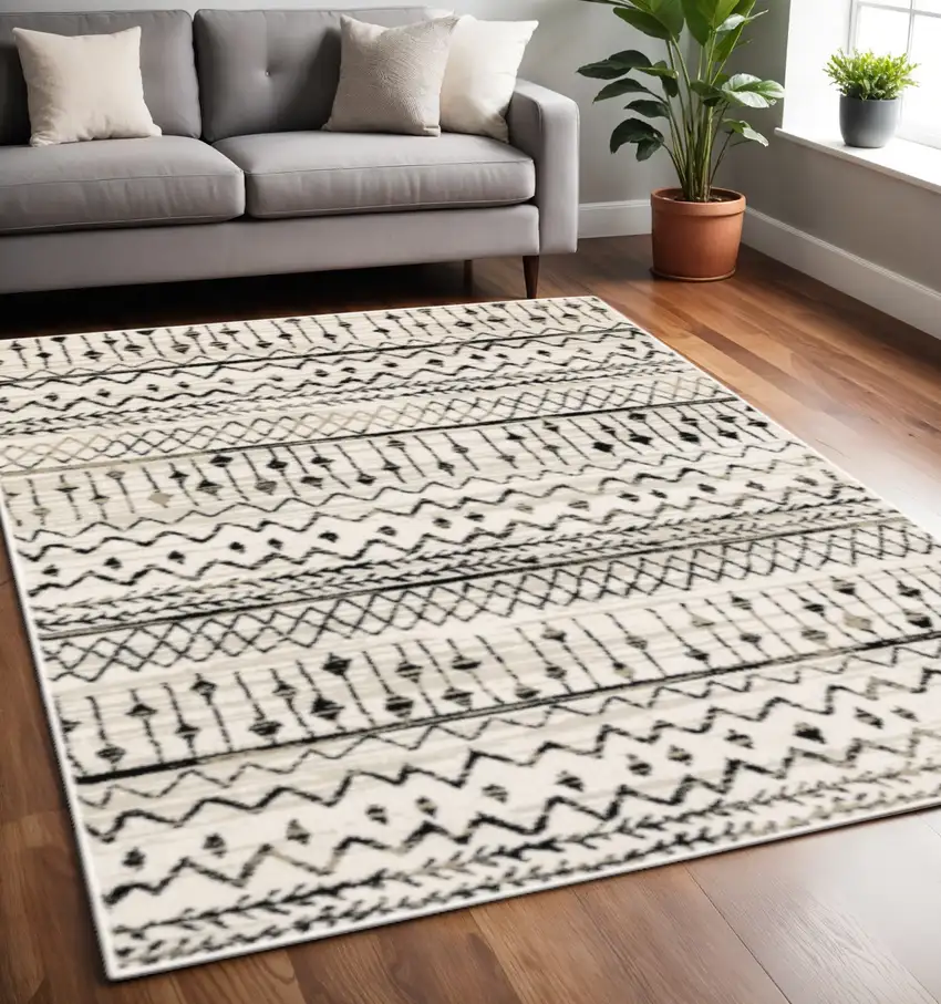 Ivory And Black Abstract Geometric Distressed Area Rug Photo 1