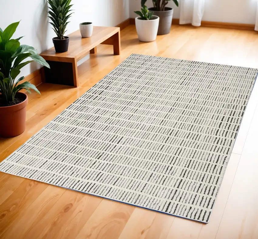 Ivory and Black Geometric Area Rug Photo 1