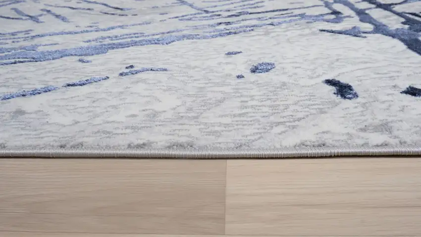 Ivory and Blue Abstract Area Rug Photo 9