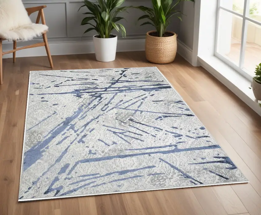Ivory and Blue Abstract Area Rug Photo 2