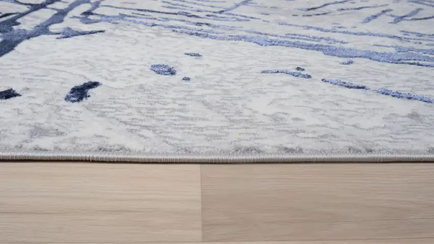 Ivory and Blue Abstract Area Rug Photo 5