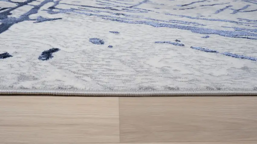 Ivory and Blue Abstract Area Rug Photo 3