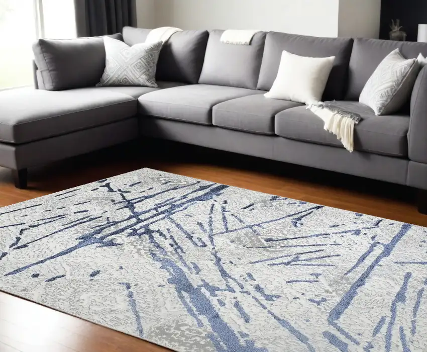 Ivory and Blue Abstract Area Rug Photo 2