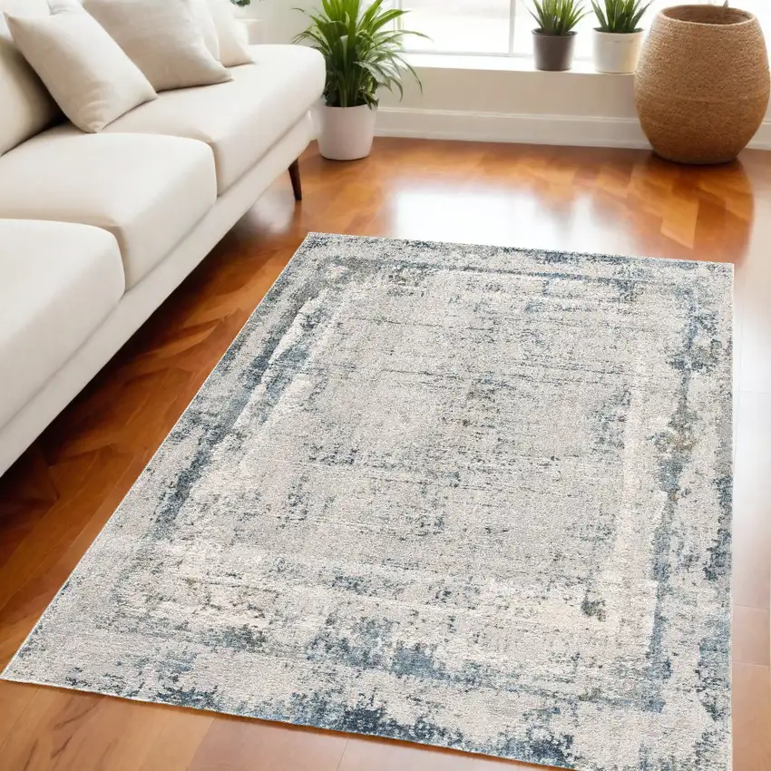 Blue and Ivory Abstract Area Rug Photo 1