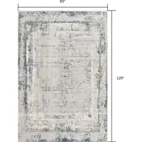 Photo of Ivory and Blue Abstract Distressed Area Rug