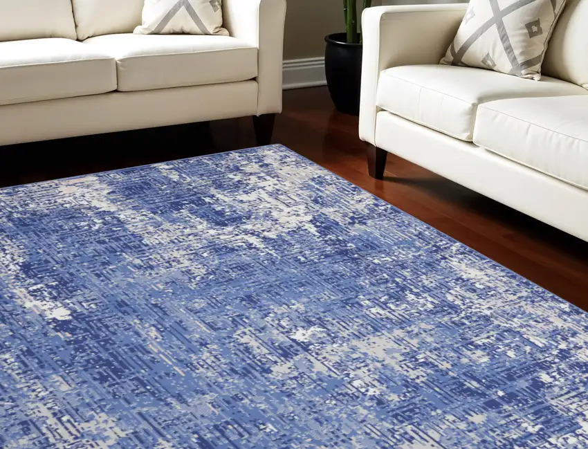 Ivory and Blue Abstract Distressed Area Rug Photo 1