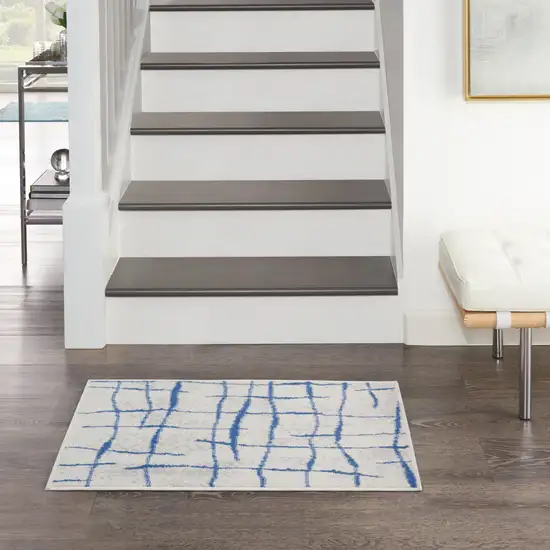 Ivory and Blue Abstract Distressed Area Rug Photo 3