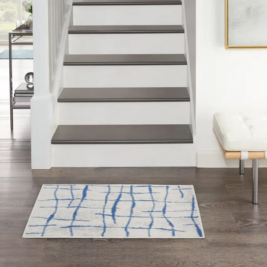 Ivory and Blue Abstract Distressed Area Rug Photo 3