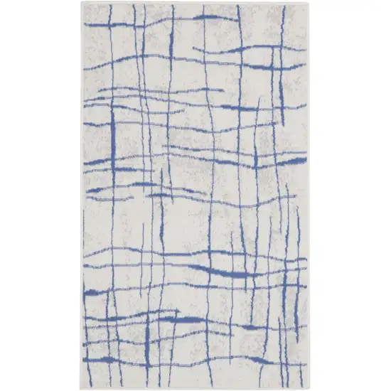 Ivory and Blue Abstract Geometric Distressed Area Rug Photo 1