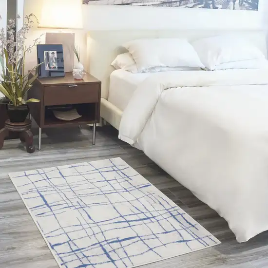 Ivory and Blue Abstract Geometric Distressed Area Rug Photo 4