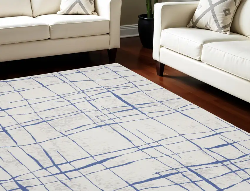 Ivory and Blue Abstract Geometric Distressed Non Skid Area Rug Photo 1
