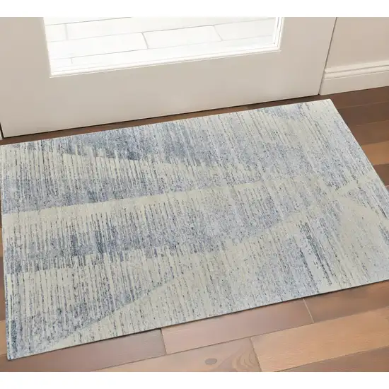 Ivory Blue And Silver Abstract Hand Knotted Distressed Area Rug Photo 1