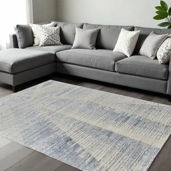 Ivory Blue And Silver Abstract Hand Knotted Distressed Area Rug Photo 1