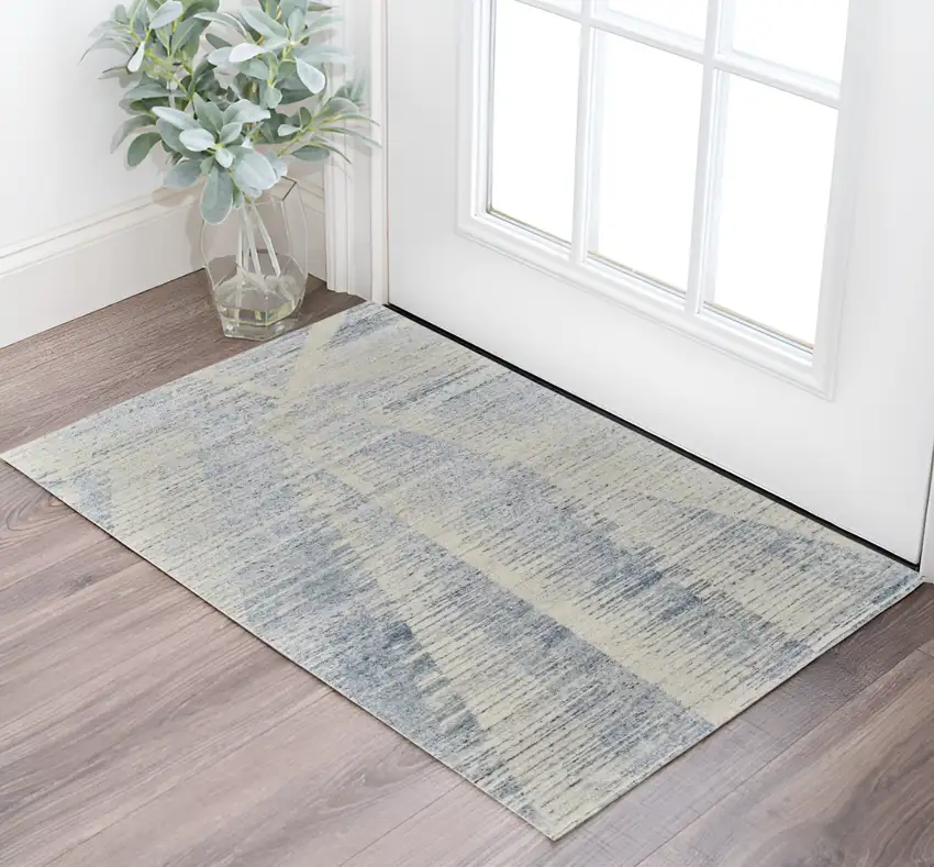 Ivory and Blue Abstract Hand Knotted Worn Faded Area Rug Photo 1