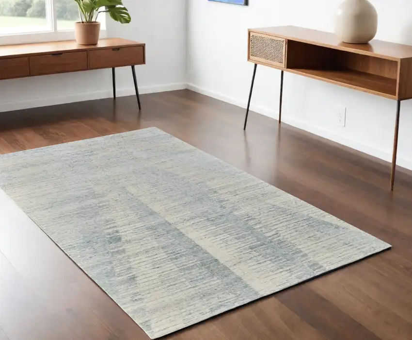 Ivory and Blue Abstract Hand Knotted Worn Faded Area Rug Photo 1