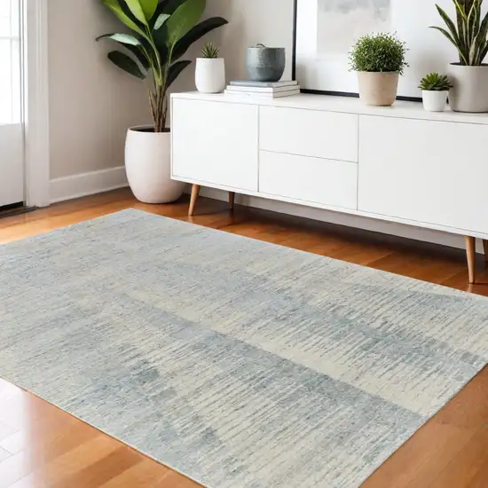 Blue Ivory And Silver Abstract Hand Knotted Distressed Area Rug Photo 1