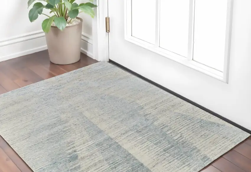 Ivory and Blue Abstract Hand Knotted Worn Faded Area Rug Photo 1