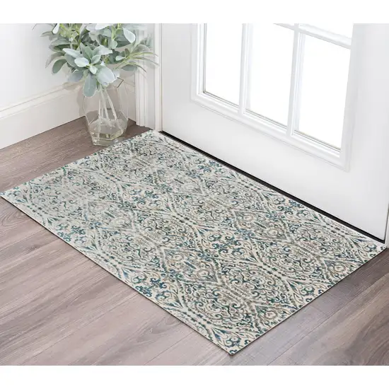 Ivory and Blue Abstract Power Loom Area Rug Photo 1