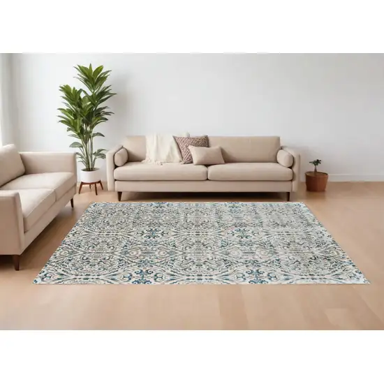 Ivory and Blue Abstract Power Loom Area Rug Photo 1