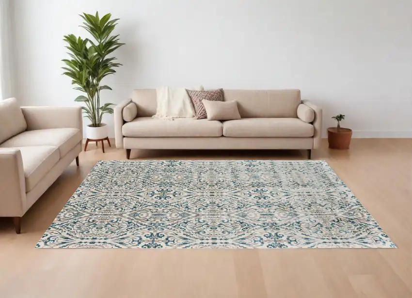 Ivory and Blue Abstract Power Loom Area Rug Photo 1