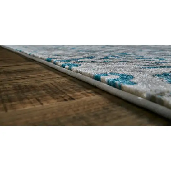 Ivory and Blue Abstract Power Loom Area Rug Photo 8