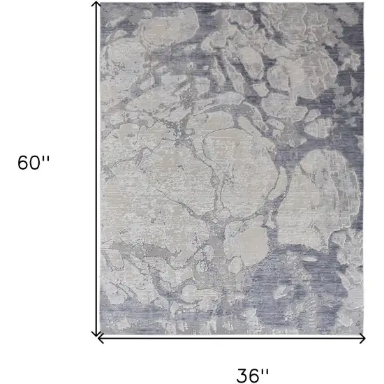 Ivory and Blue Abstract Power Loom Worn Faded Area Rug Photo 3