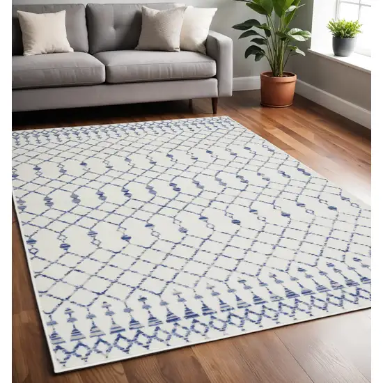 Ivory And Blue Geometric Area Rug Photo 2