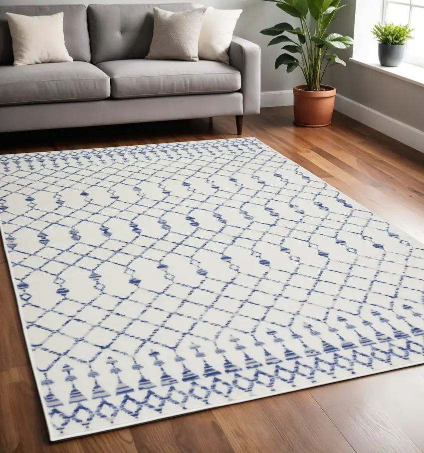 Ivory And Blue Geometric Area Rug Photo 2