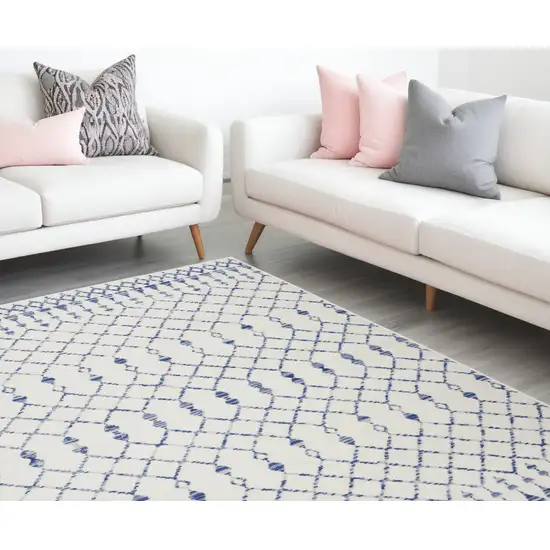 Ivory And Blue Geometric Area Rug Photo 2
