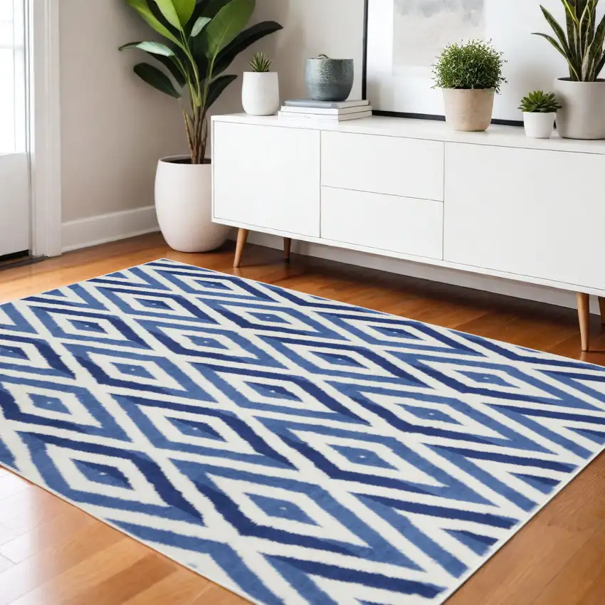 Ivory And Blue Geometric Area Rug Photo 2