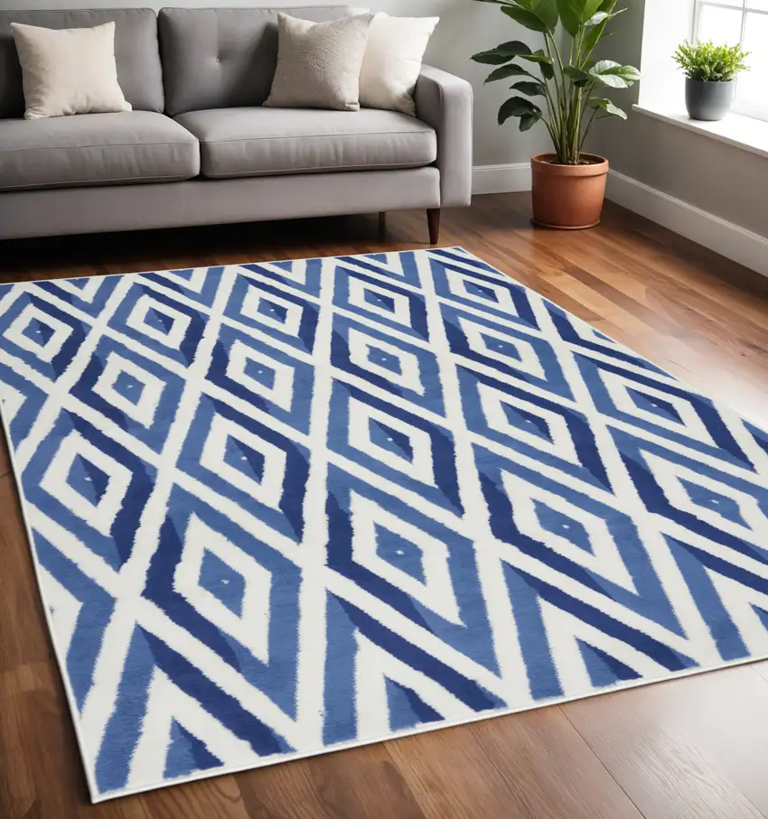 Ivory And Blue Geometric Area Rug Photo 2