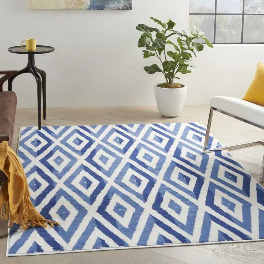 Ivory And Blue Geometric Area Rug Photo 3