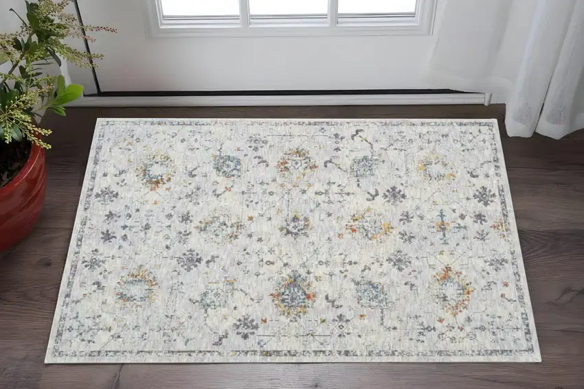 Ivory and Blue Floral Area Rug Photo 1