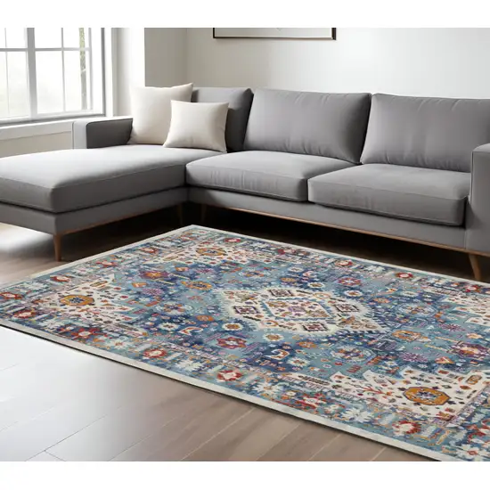 Ivory And Blue Floral Distressed Area Rug Photo 1