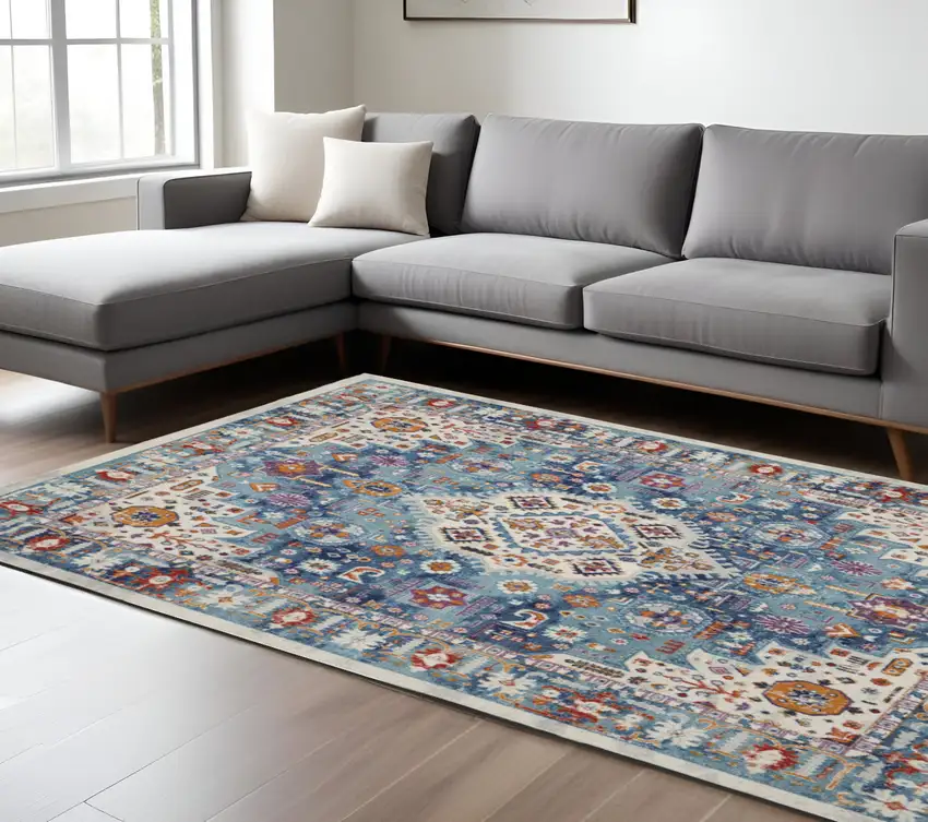 Ivory And Blue Floral Distressed Area Rug Photo 1