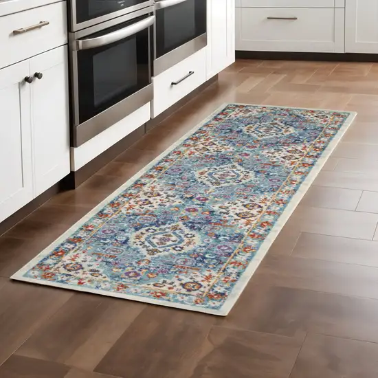 8' Ivory And Blue Floral Distressed Runner Rug Photo 1