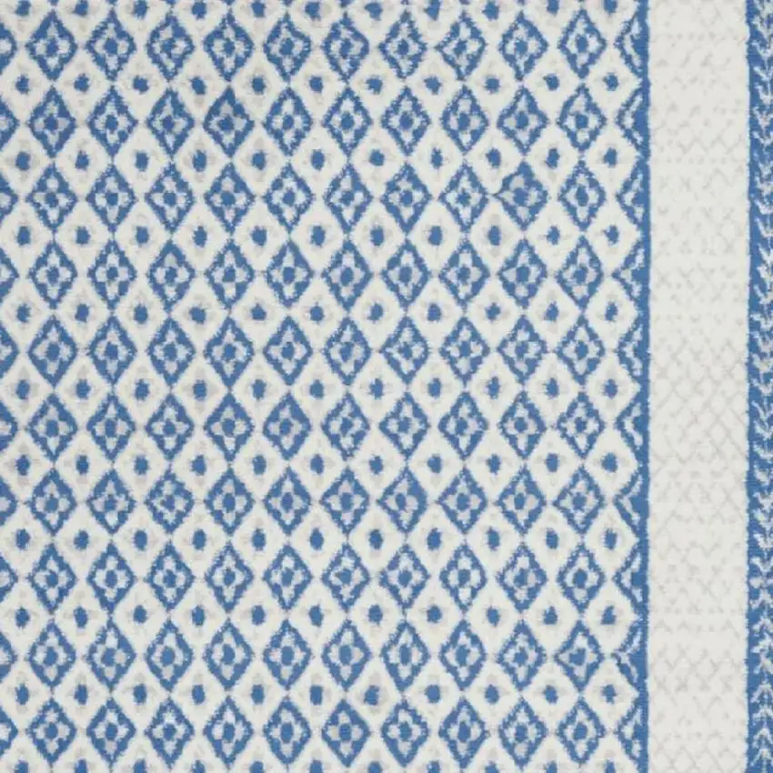 Ivory And Blue Geometric Area Rug Photo 1
