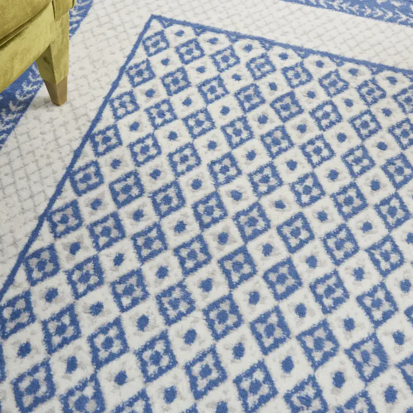 Ivory And Blue Geometric Area Rug Photo 9