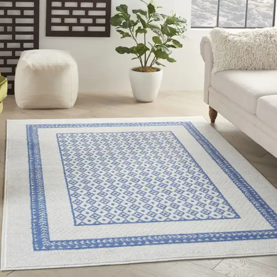 Ivory And Blue Geometric Area Rug Photo 4