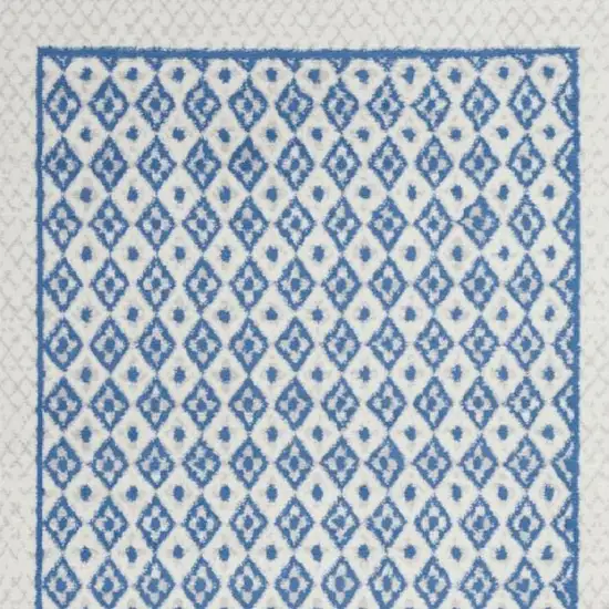 Ivory And Blue Geometric Area Rug Photo 1