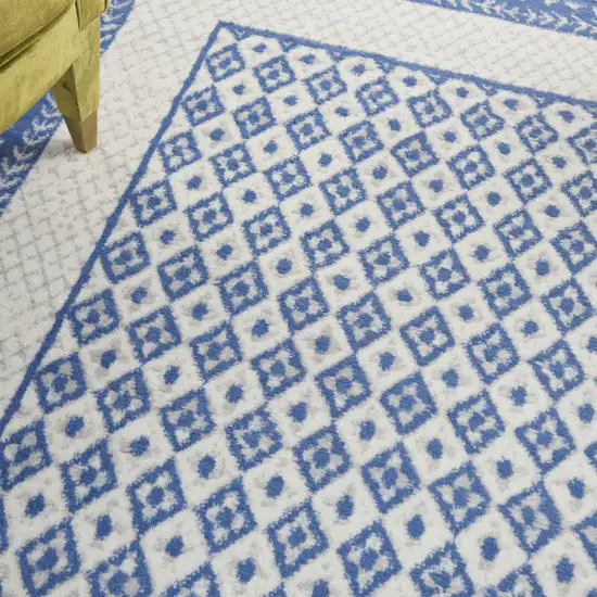 Ivory And Blue Geometric Area Rug Photo 9