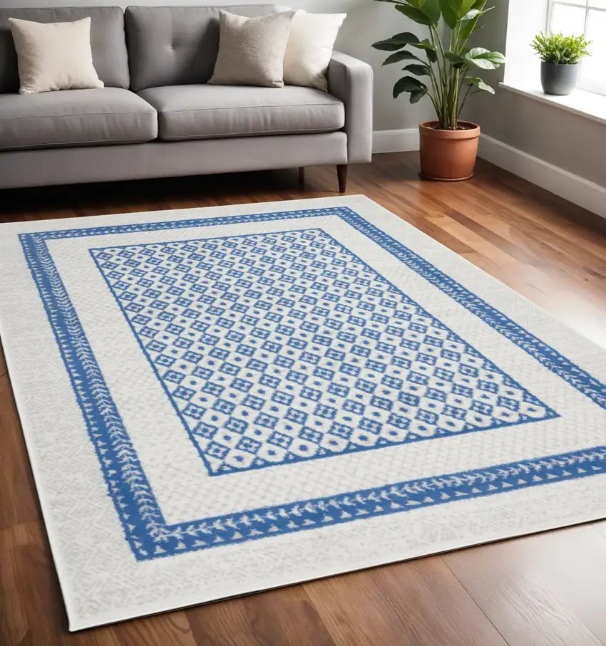 Ivory And Blue Geometric Area Rug Photo 2
