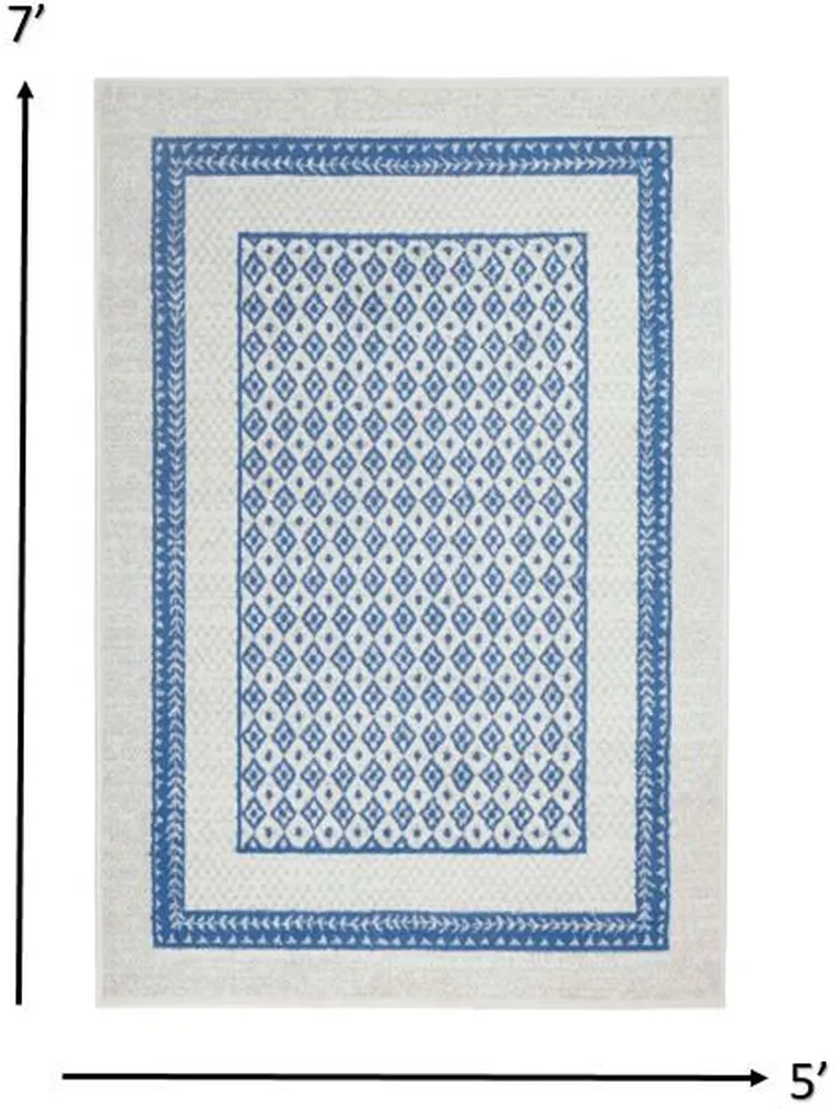 Ivory and Blue Geometric Area Rug Photo 1