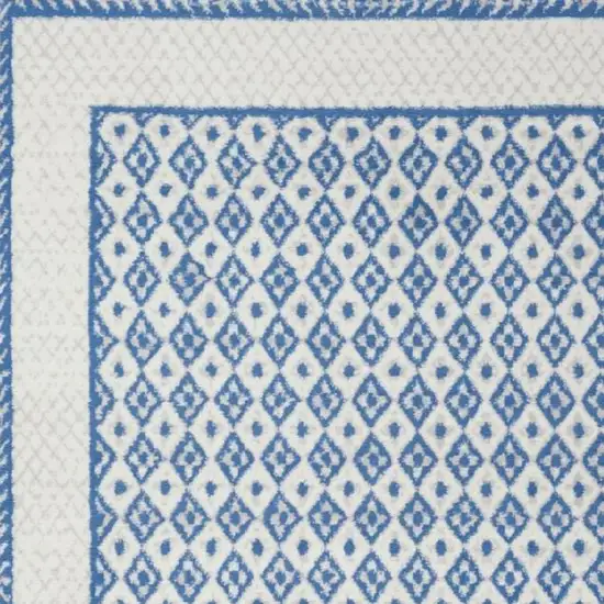 Ivory And Blue Geometric Area Rug Photo 3