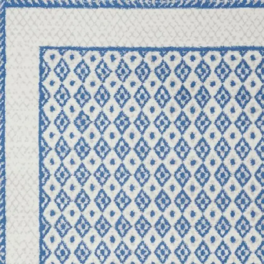 Ivory And Blue Geometric Area Rug Photo 3