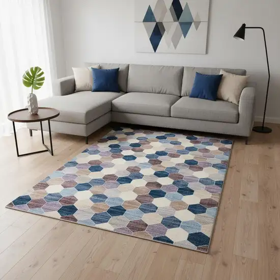 Ivory and Blue Geometric Distressed Area Rug Photo 1